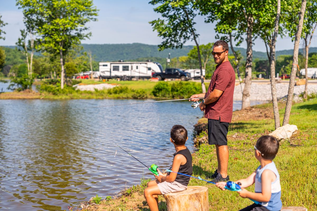 Kids fishing at a lakeside campground