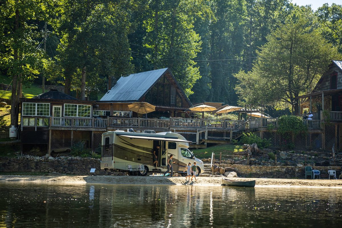 Luxury motorhome on a scenic road, RV lifestyle photography