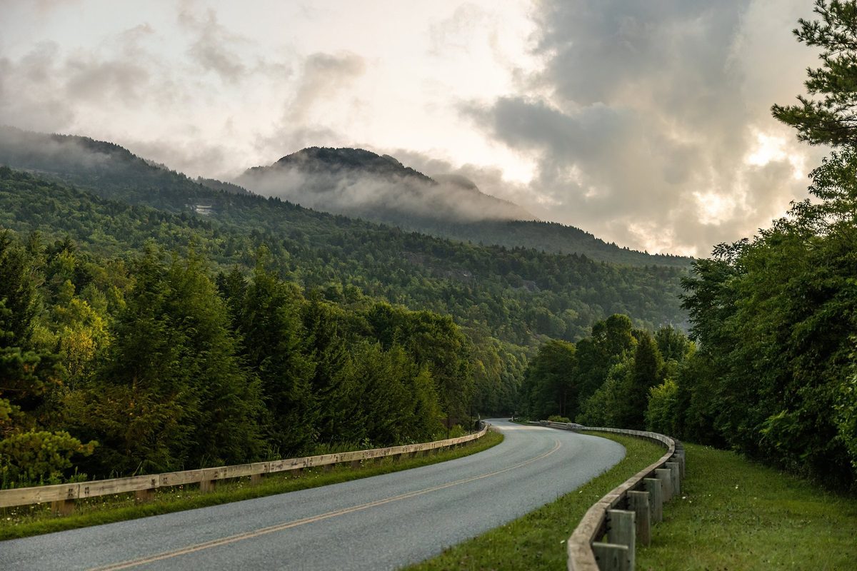 Luxury motorhome on a scenic road, RV lifestyle photography