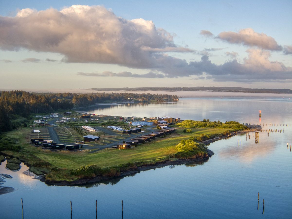 Aerial view of a modern cabin resort on the water