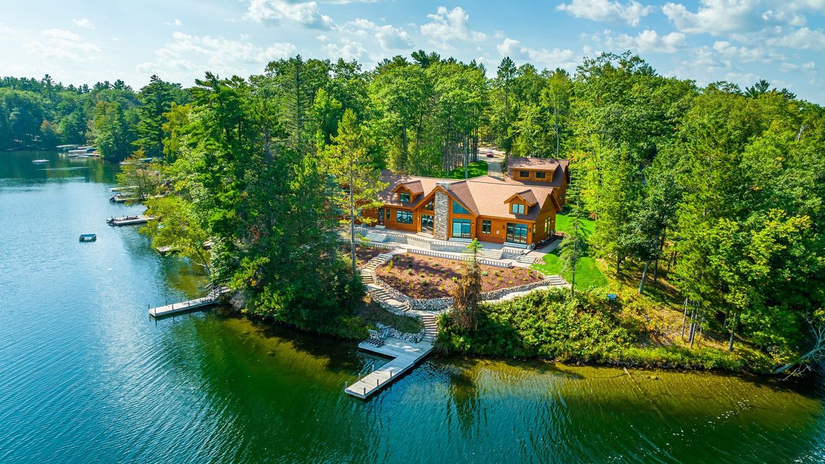 Aerial view of a Dickinson Homes custom lake home