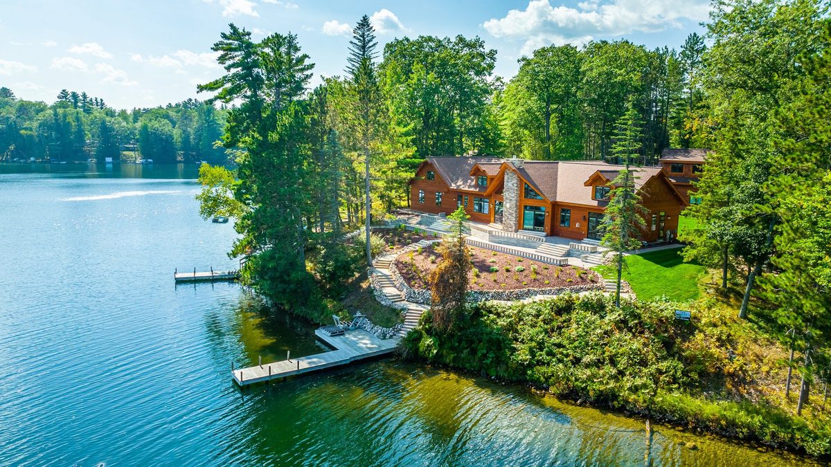 Aerial view of a Dickinson Homes custom lake home