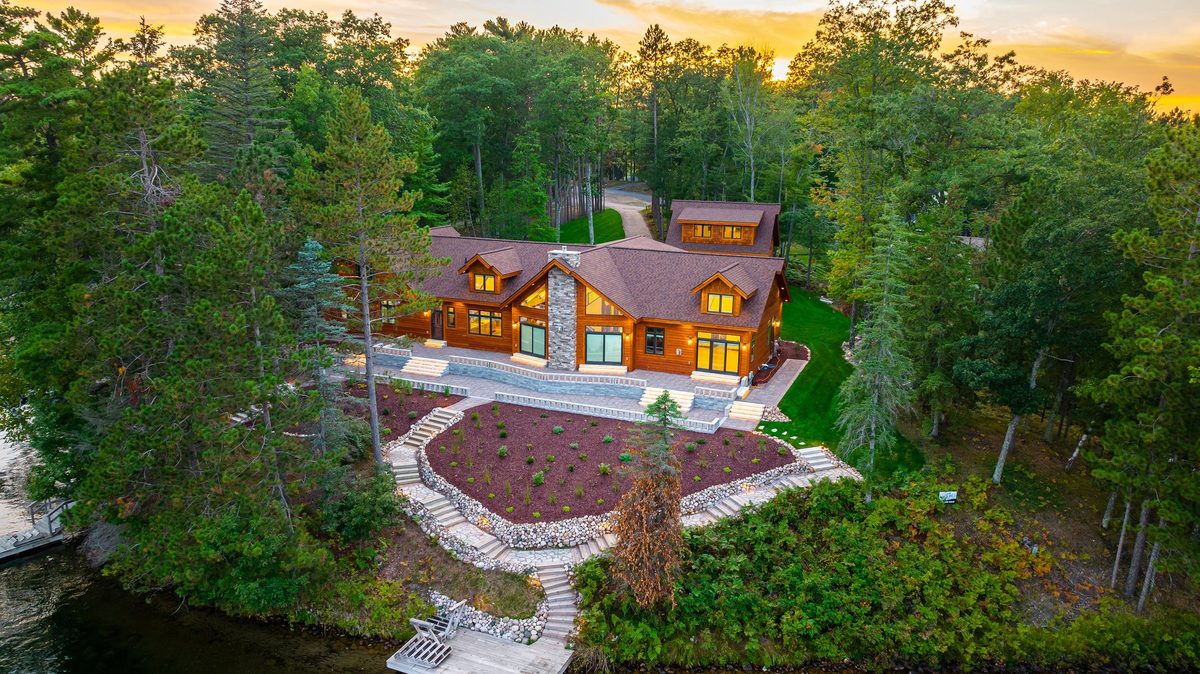 Aerial view of a Dickinson Homes custom lake home