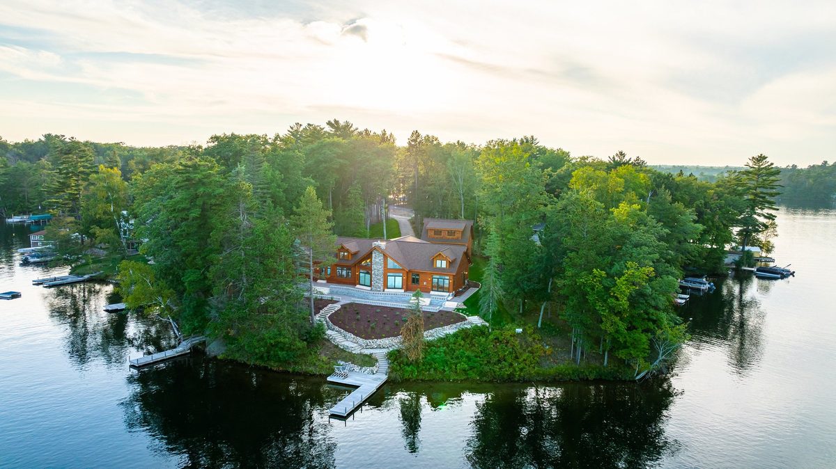Aerial view of a Dickinson Homes custom lake home