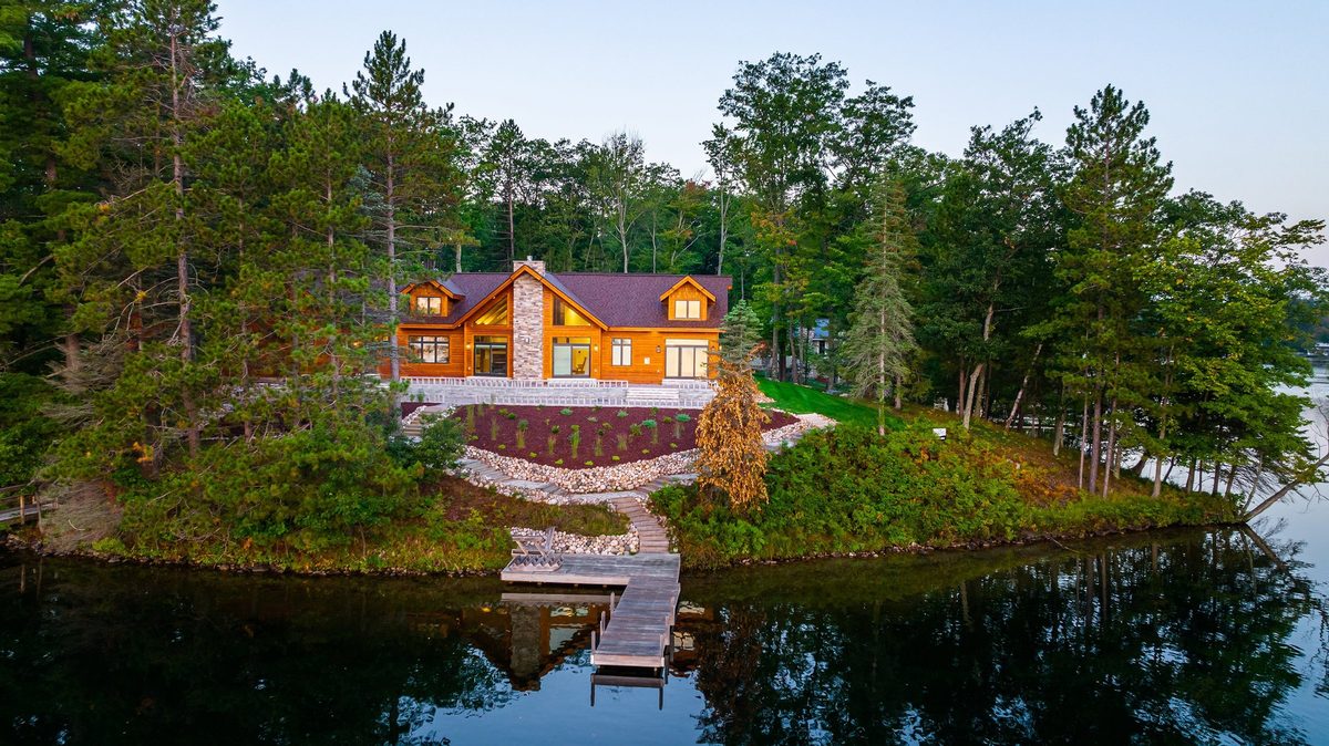 Aerial view of a Dickinson Homes custom lake home