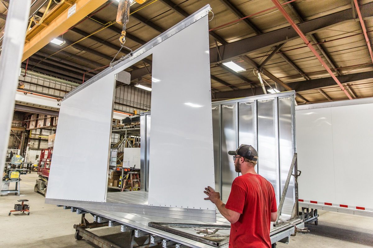 Fabrication and welding inside a truck body manufacturing plant