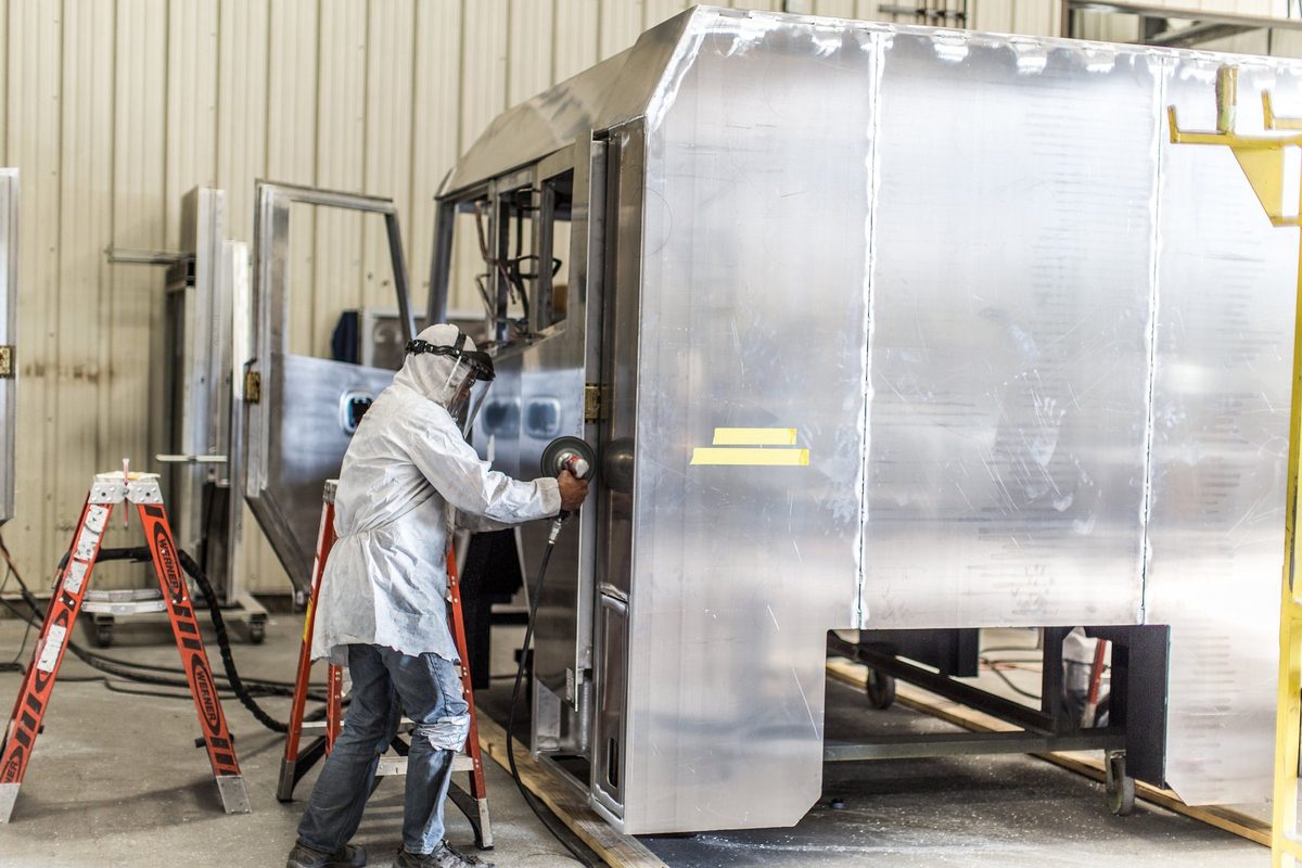 Fabrication and welding inside a truck body manufacturing plant