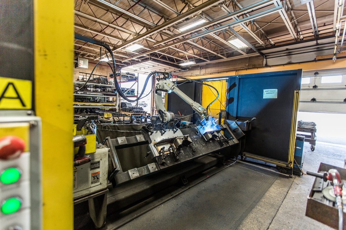 Fabrication and welding inside a truck body manufacturing plant