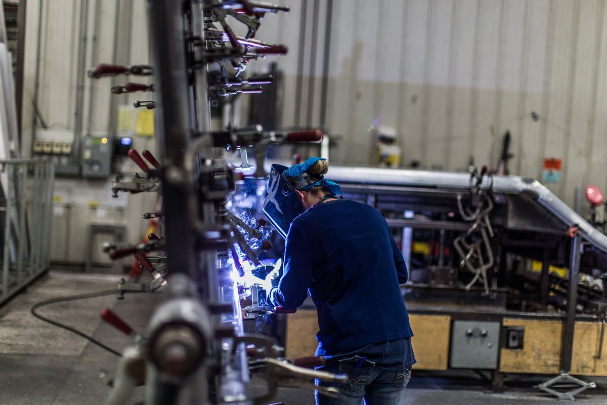 Fabrication and welding inside a truck body manufacturing plant