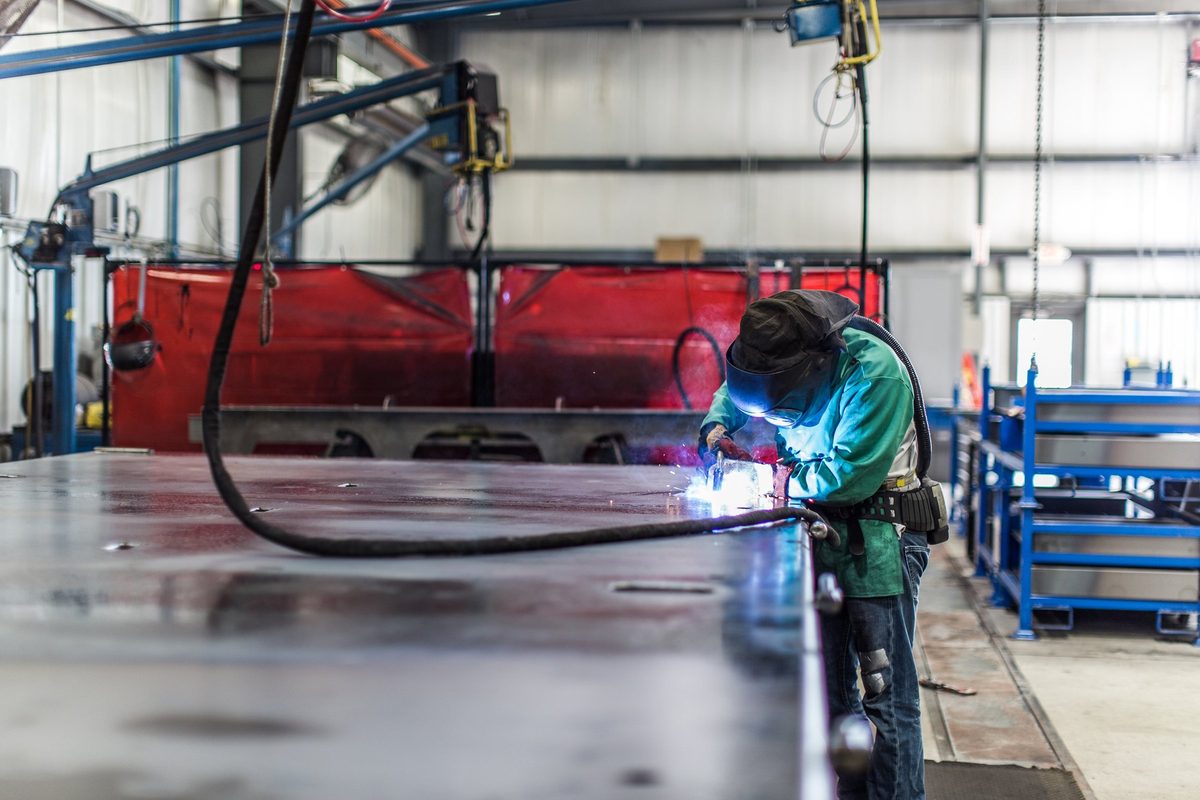 Fabrication and welding inside a truck body manufacturing plant