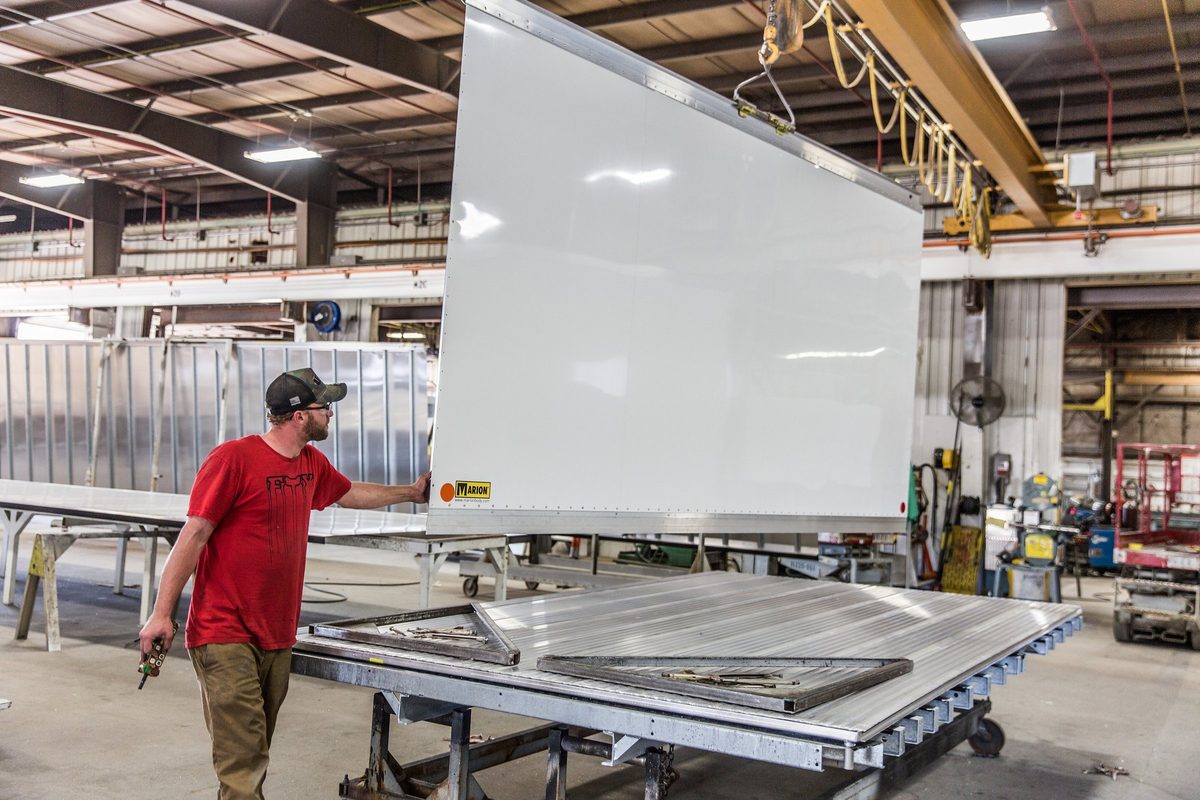 Fabrication and welding inside a truck body manufacturing plant