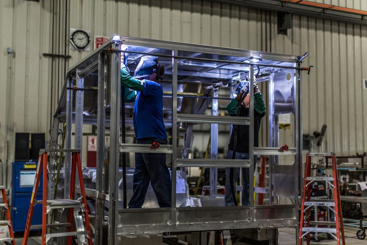 Fabrication and welding inside a truck body manufacturing plant