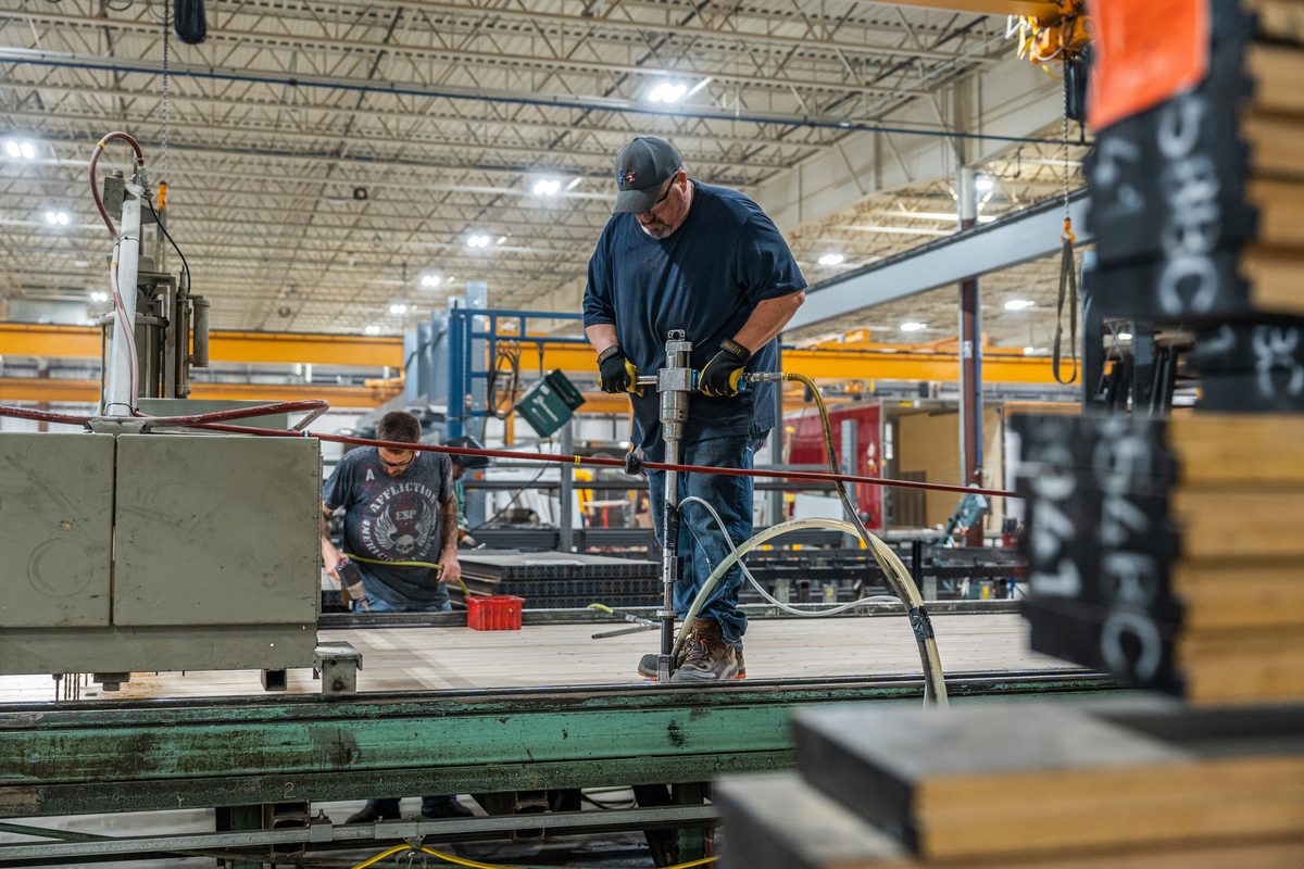 Fabrication and welding inside a truck body manufacturing plant