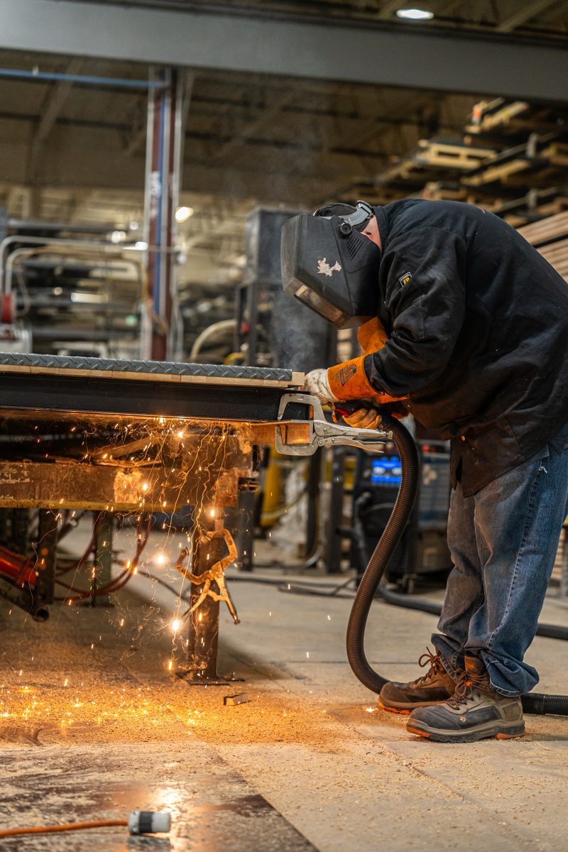 Fabrication and welding inside a truck body manufacturing plant