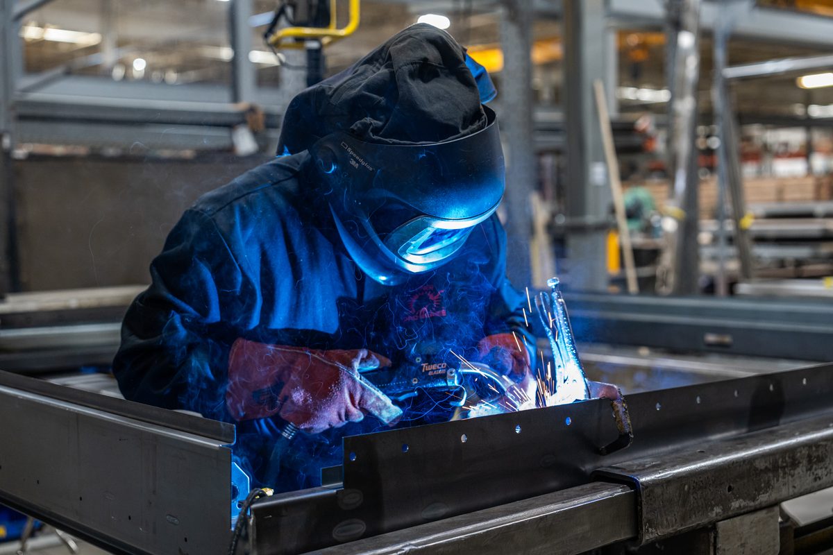 Fabrication and welding inside a truck body manufacturing plant
