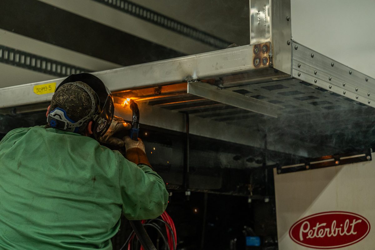 Fabrication and welding inside a truck body manufacturing plant