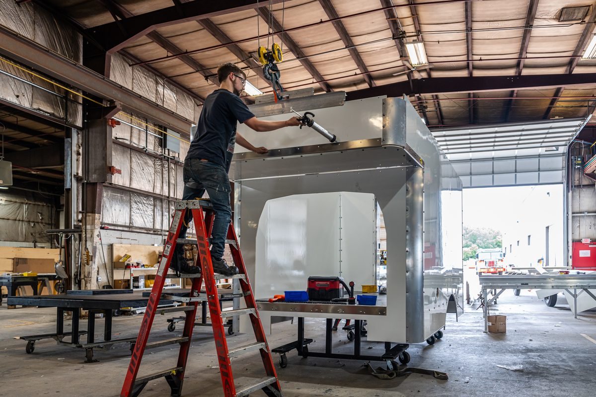 Fabrication and welding inside a truck body manufacturing plant
