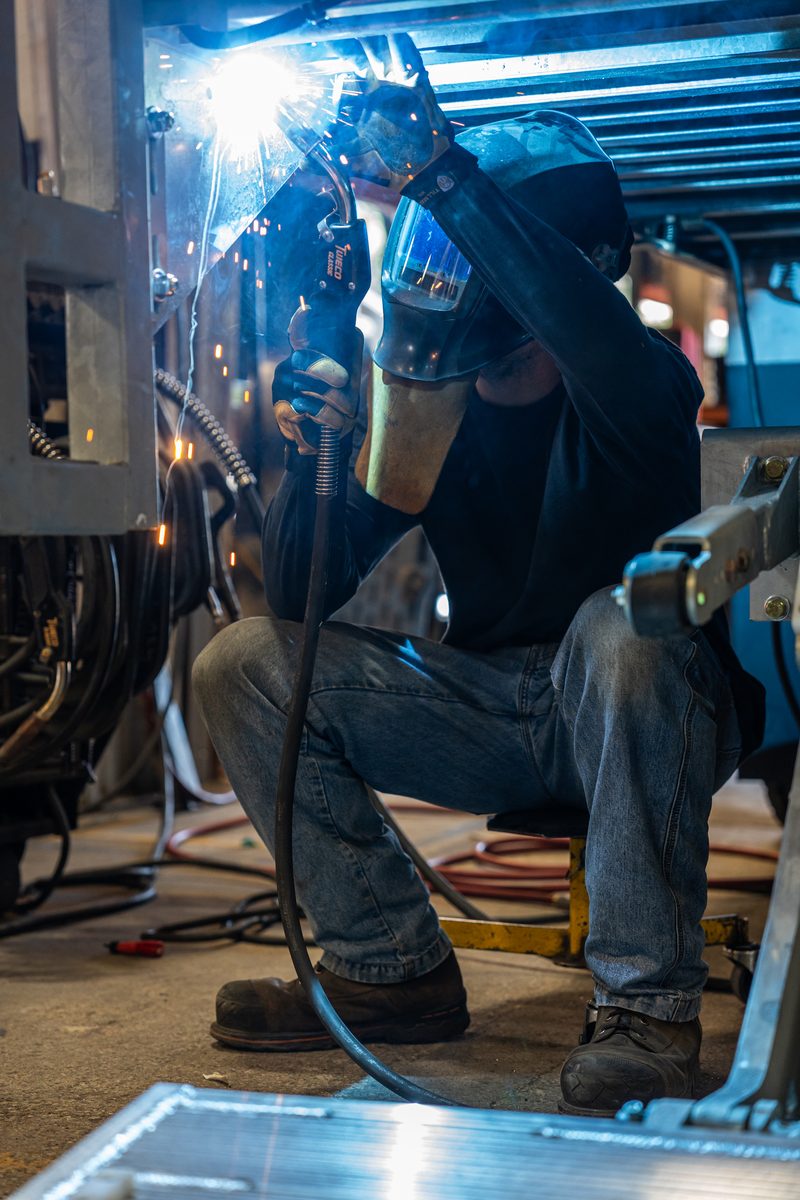 Fabrication and welding inside a truck body manufacturing plant