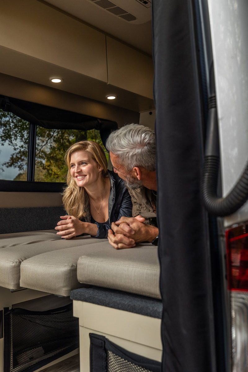 Luxury motorhome on a scenic road, RV lifestyle photography