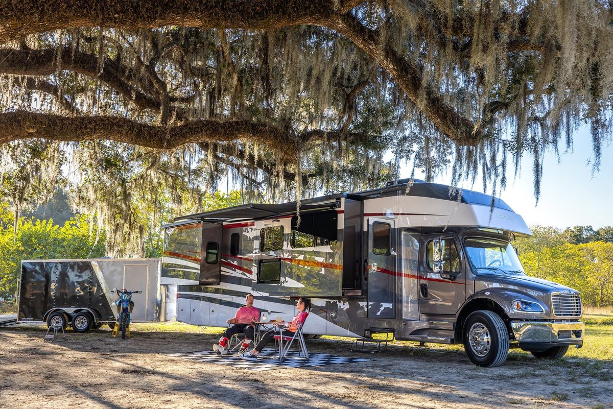 Luxury motorhome on a scenic road, RV lifestyle photography