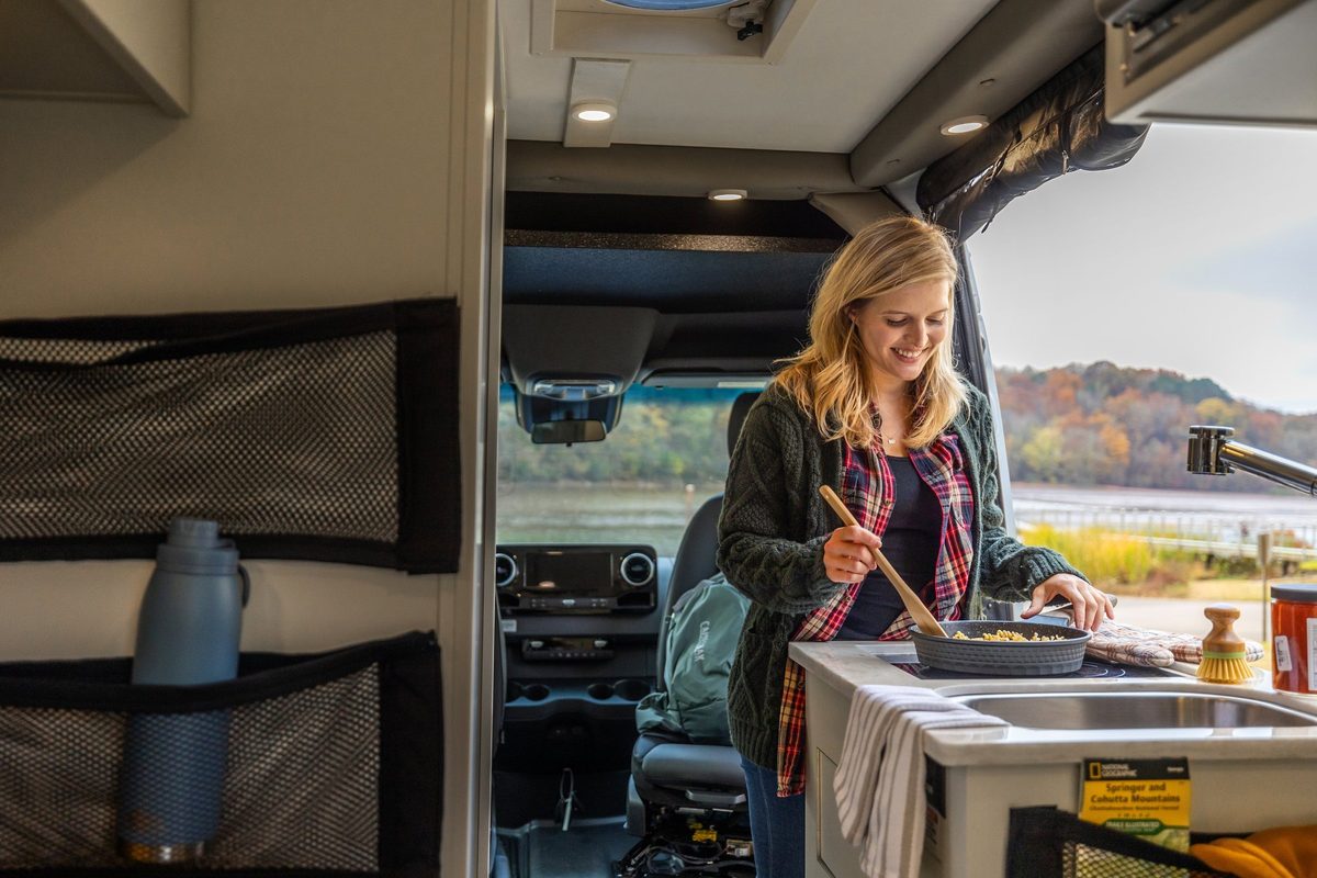 Luxury motorhome on a scenic road, RV lifestyle photography