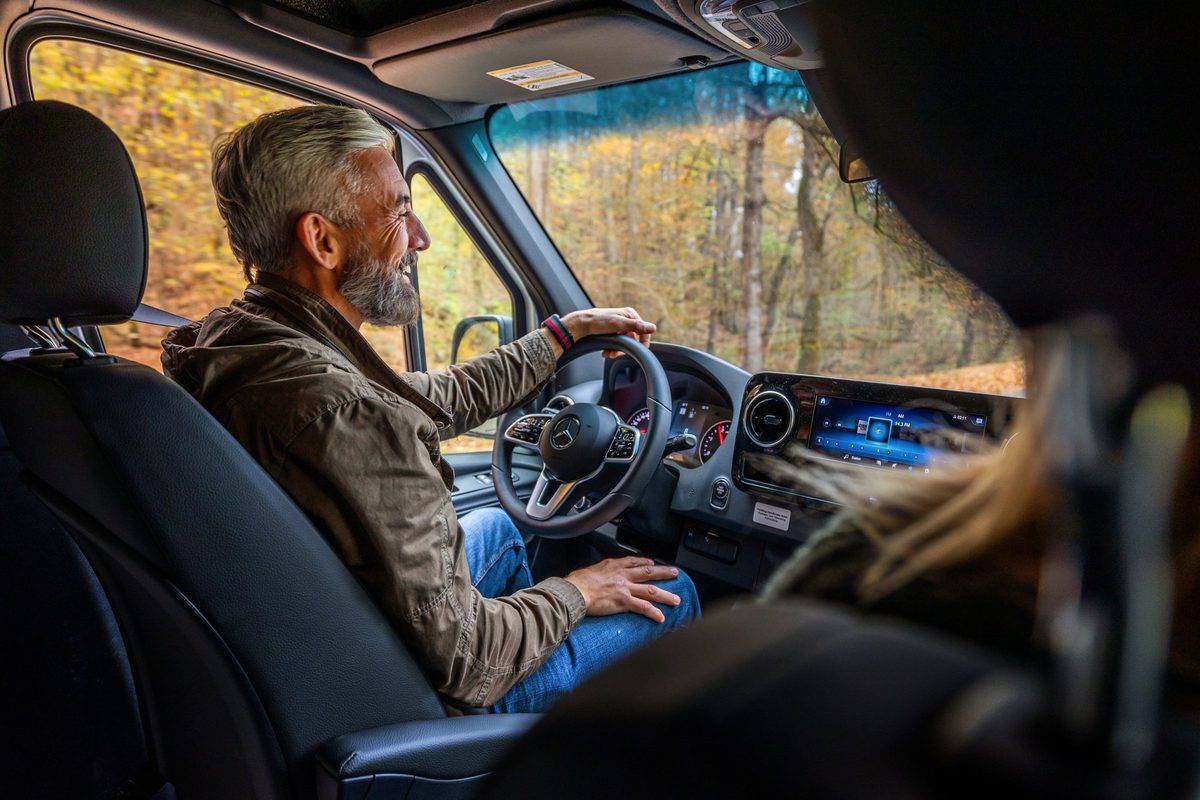 Luxury motorhome on a scenic road, RV lifestyle photography
