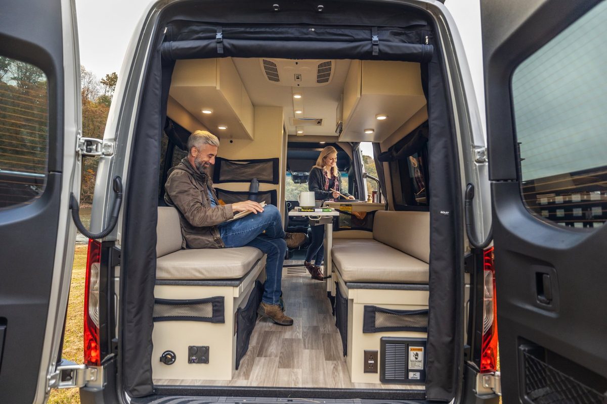 Luxury motorhome on a scenic road, RV lifestyle photography