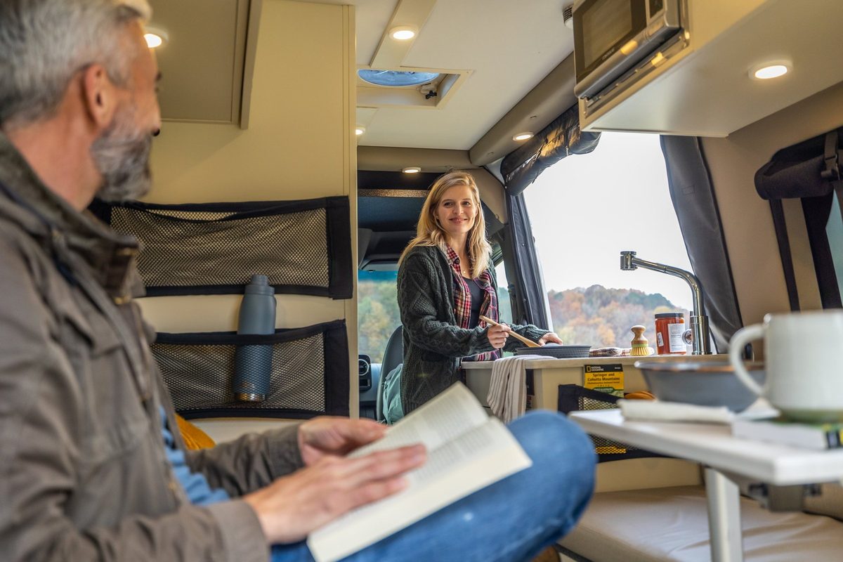 Luxury motorhome on a scenic road, RV lifestyle photography