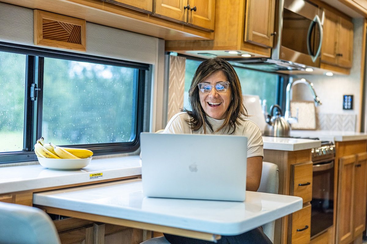 Luxury motorhome on a scenic road, RV lifestyle photography