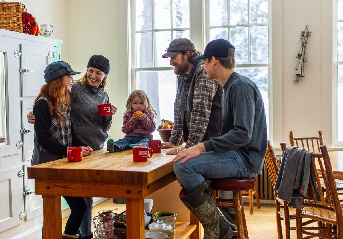 Friends outdoors in rugged Northwoods apparel, lifestyle brand photography
