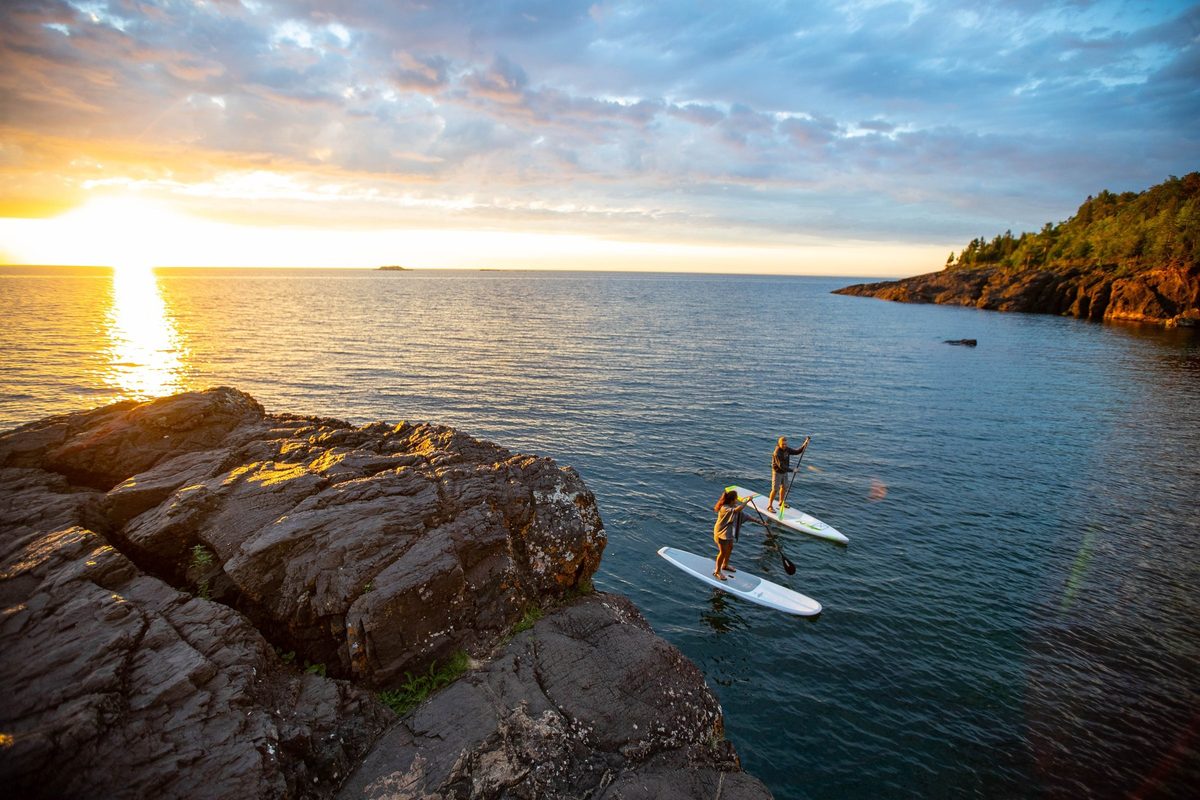 Friends outdoors in rugged Northwoods apparel, lifestyle brand photography