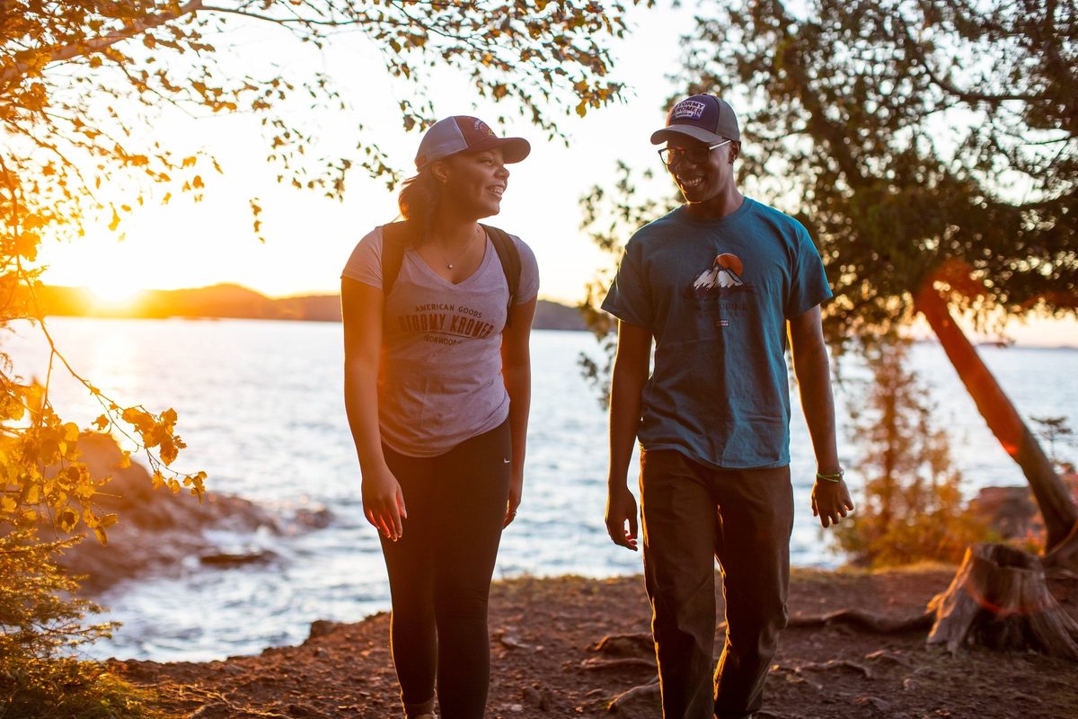Friends outdoors in rugged Northwoods apparel, lifestyle brand photography