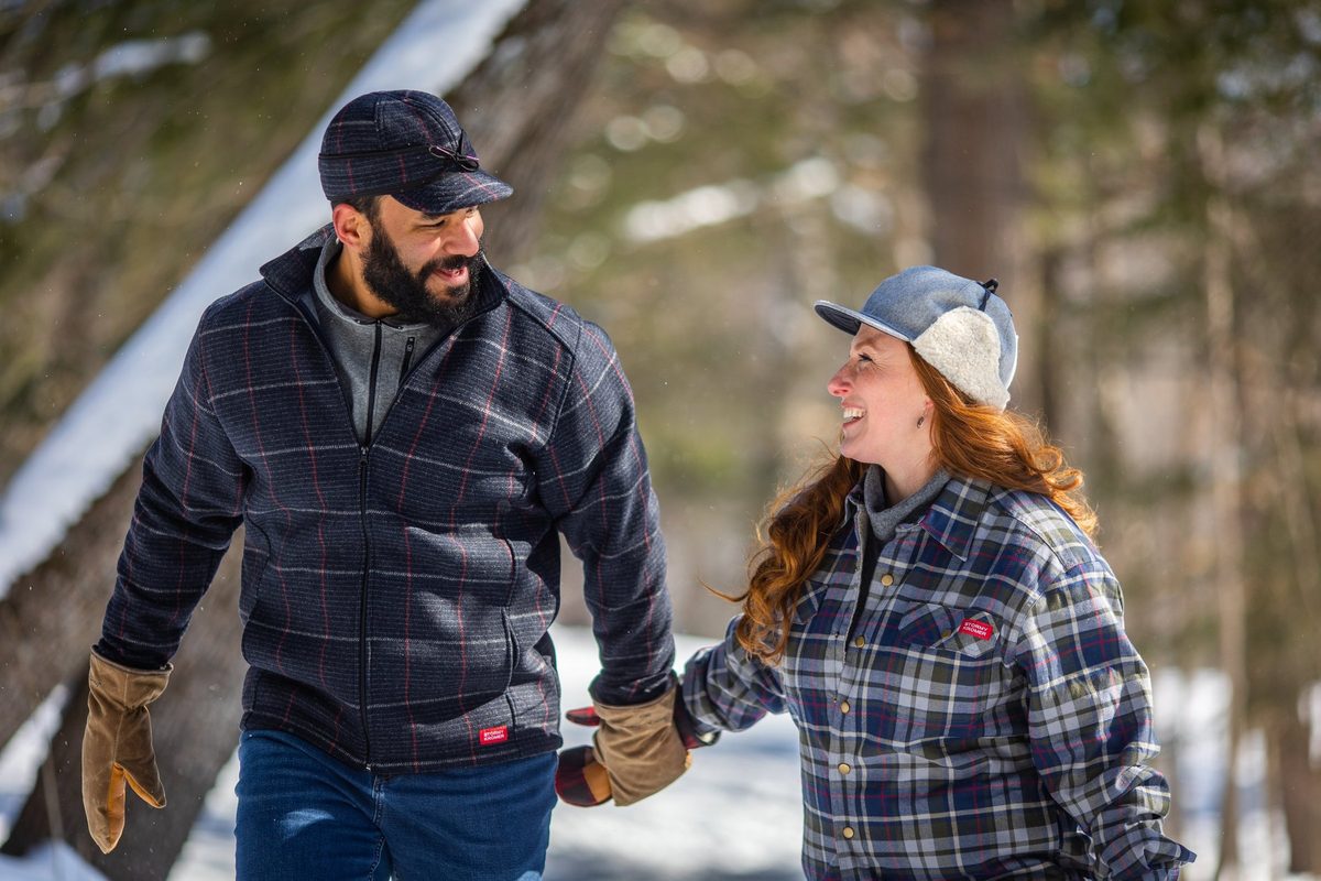 Friends outdoors in rugged Northwoods apparel, lifestyle brand photography