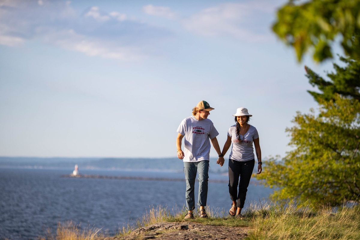 Friends outdoors in rugged Northwoods apparel, lifestyle brand photography