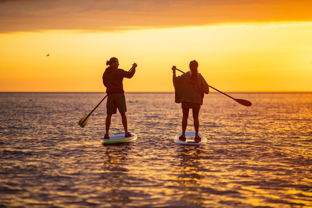 Friends outdoors in rugged Northwoods apparel, lifestyle brand photography