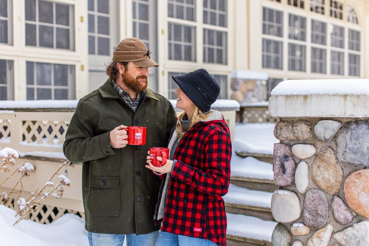 Friends outdoors in rugged Northwoods apparel, lifestyle brand photography