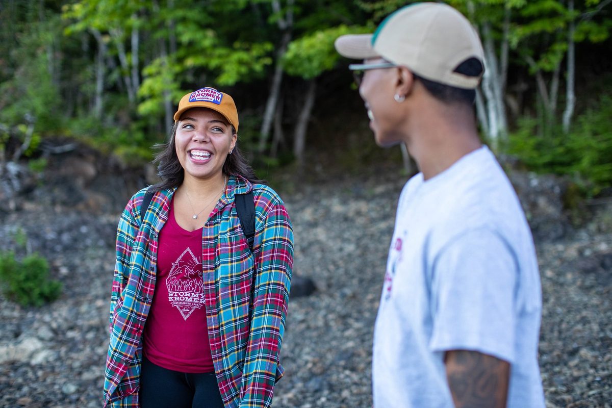 Friends outdoors in rugged Northwoods apparel, lifestyle brand photography