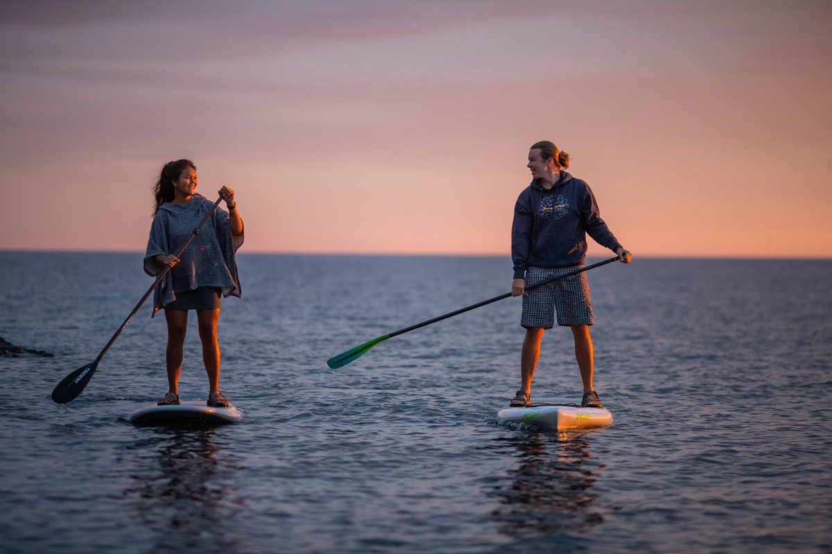 Friends outdoors in rugged Northwoods apparel, lifestyle brand photography