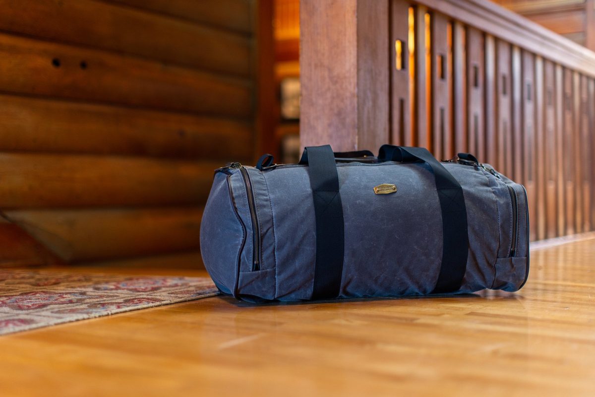 Friends outdoors in rugged Northwoods apparel, lifestyle brand photography