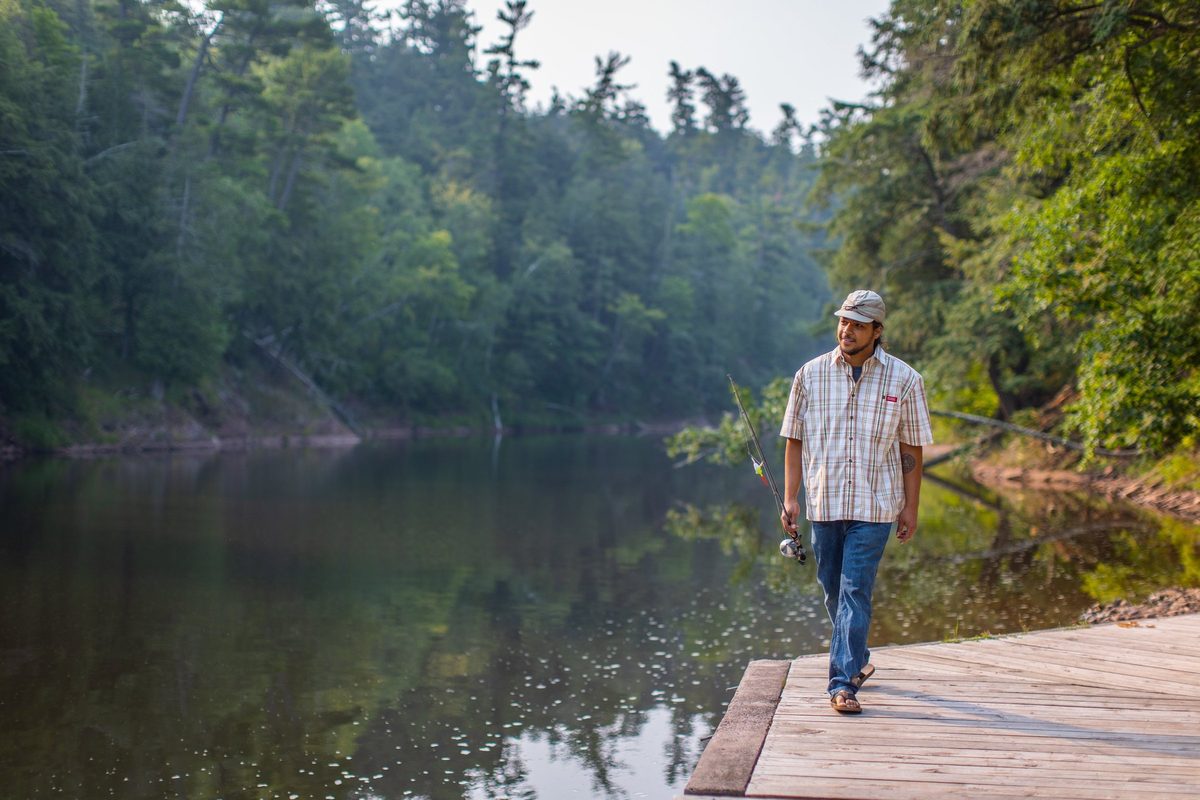 Friends outdoors in rugged Northwoods apparel, lifestyle brand photography