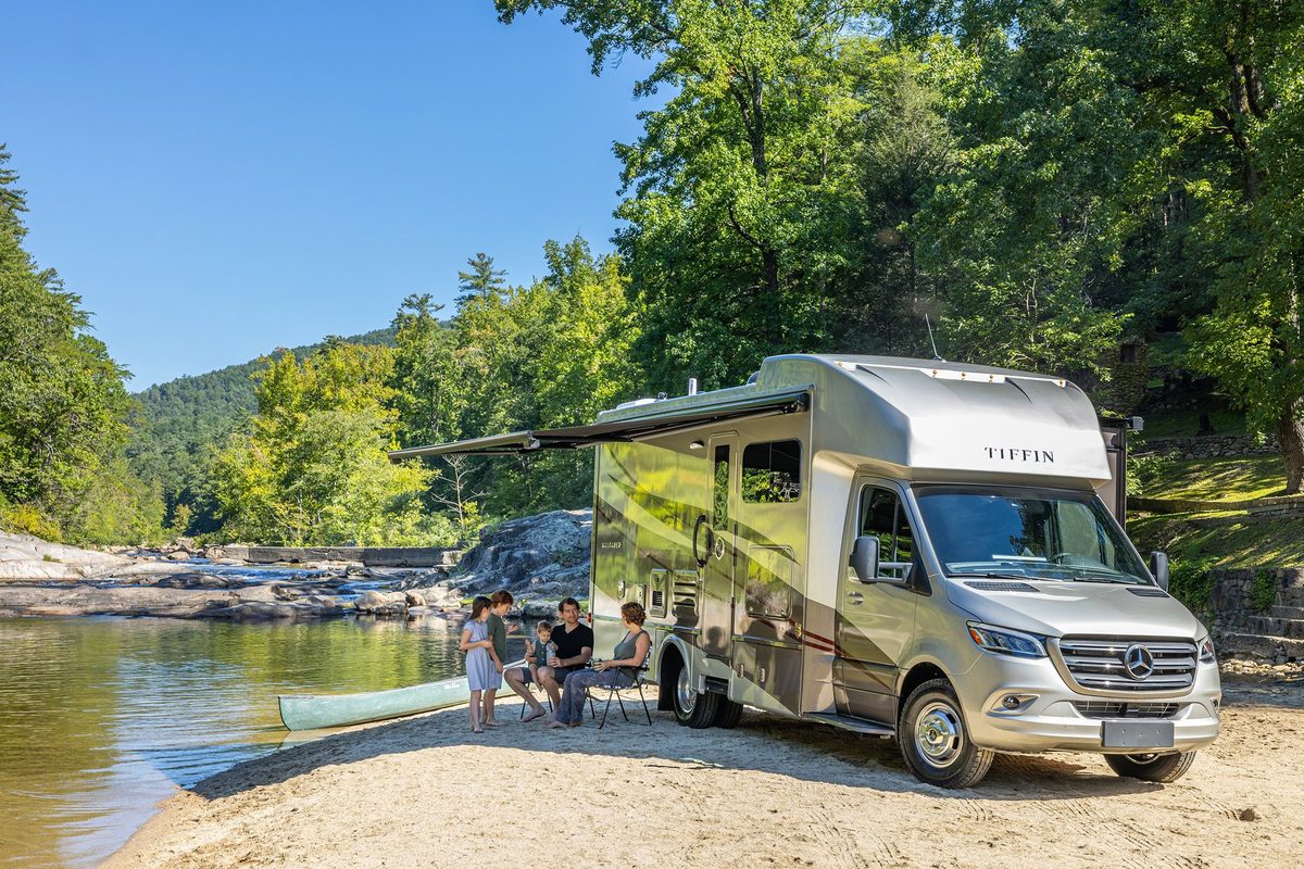 Luxury motorhome on a scenic road, RV lifestyle photography