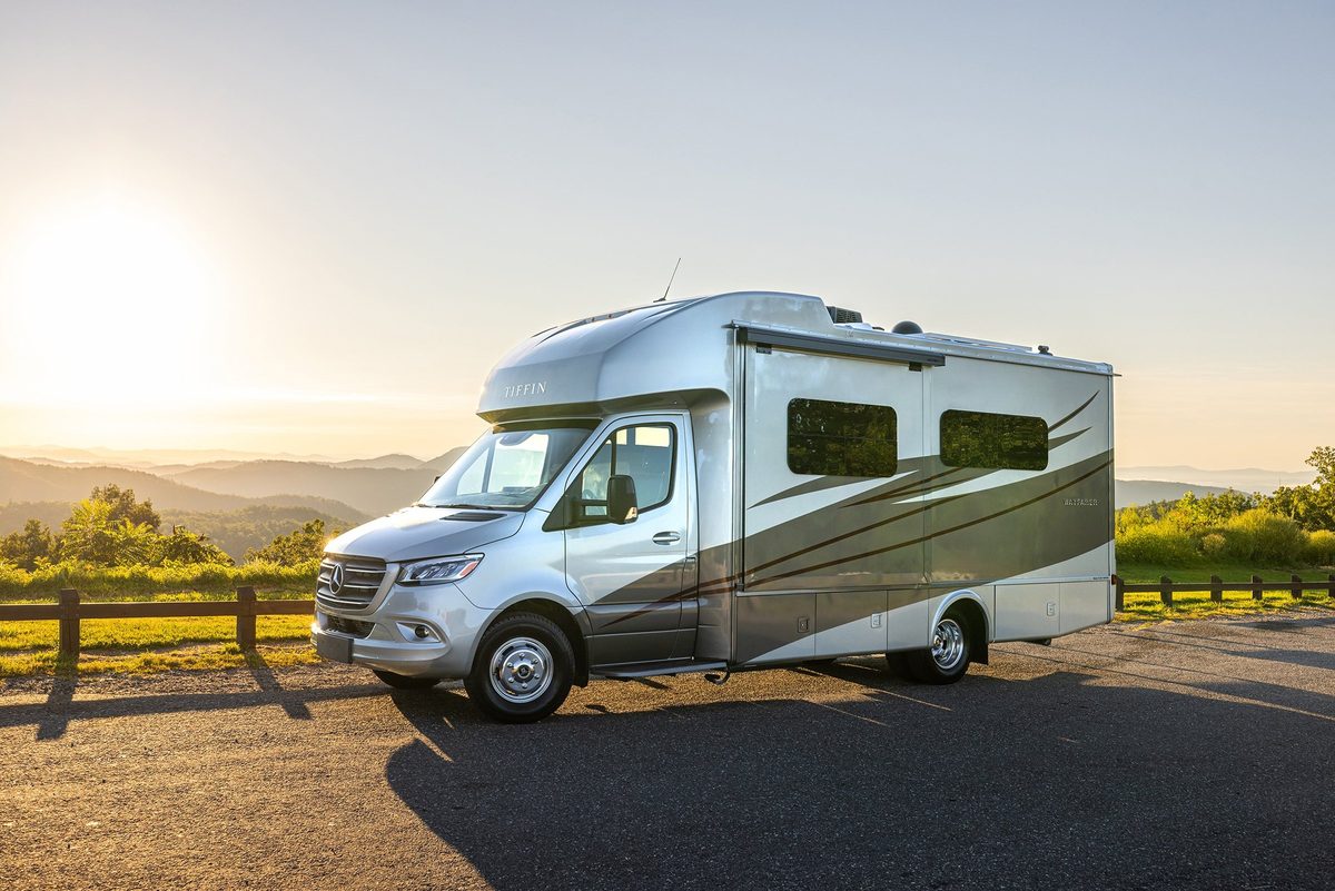 Luxury motorhome on a scenic road, RV lifestyle photography