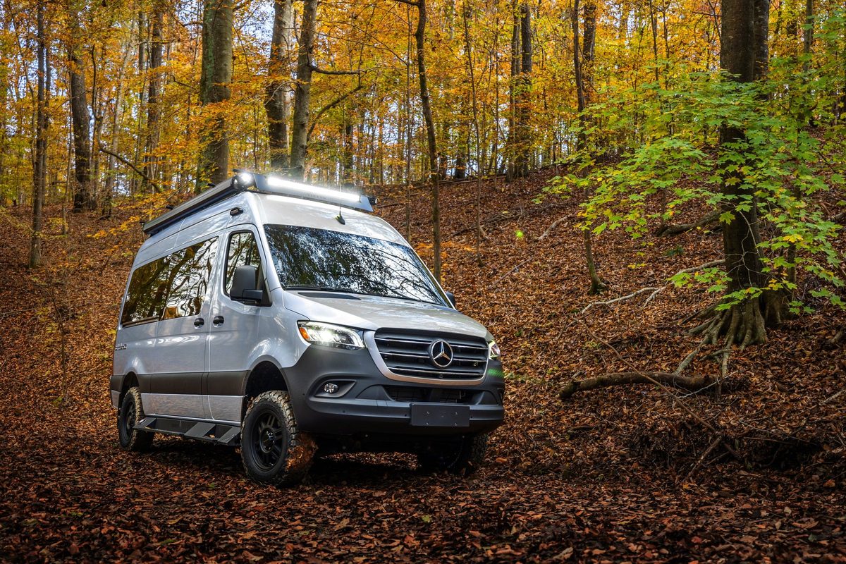 Luxury motorhome on a scenic road, RV lifestyle photography