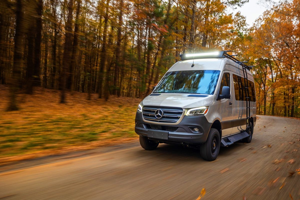 Luxury motorhome on a scenic road, RV lifestyle photography