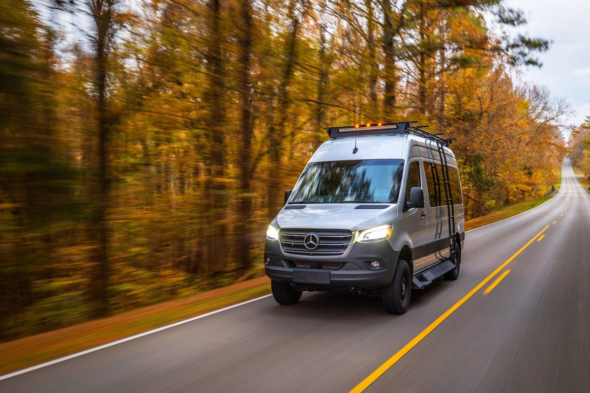 Luxury motorhome on a scenic road, RV lifestyle photography
