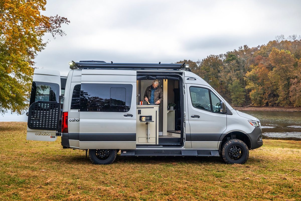 Luxury motorhome on a scenic road, RV lifestyle photography
