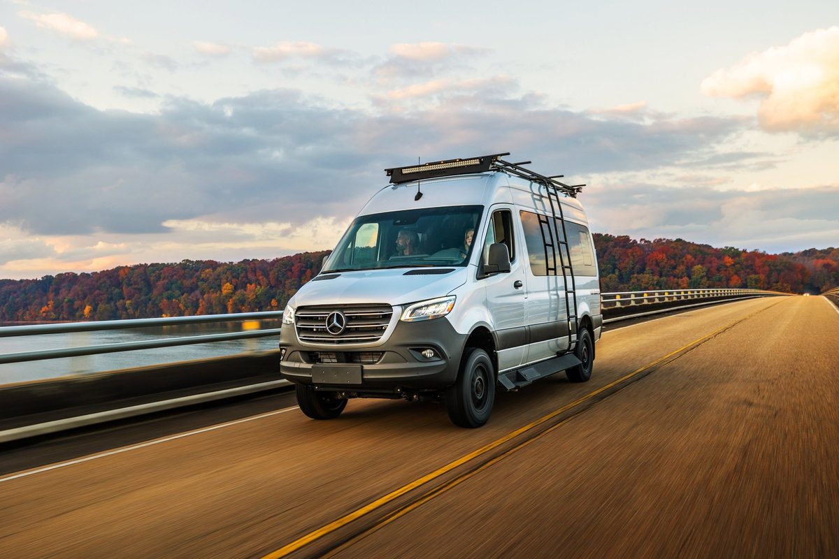 Luxury motorhome on a scenic road, RV lifestyle photography