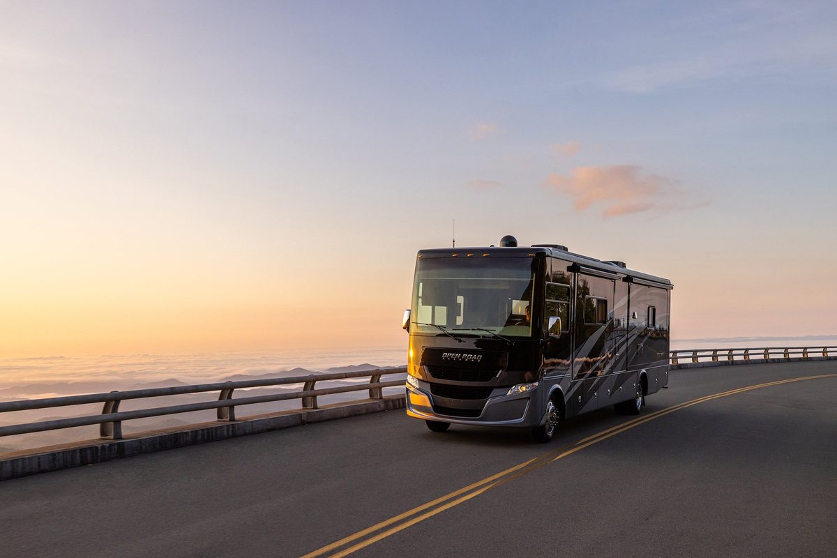 Luxury motorhome on a scenic road, RV lifestyle photography